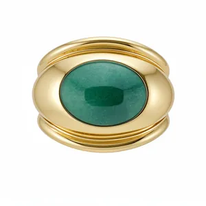 Elegant gold-plated wide ribbed bangle bracelet with a large oval green gemstone inlay