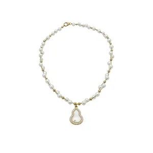 Elegant 18k gold plated pearl necklace with sparkling zircon gourd pendant detail