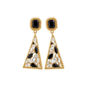 Orecchini geometrici dorati vintage con pietre nere e cristalli brillanti