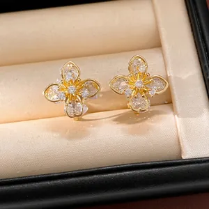 Elegant clover flower ear clips with sparkling zircons and premium 18k gold plating