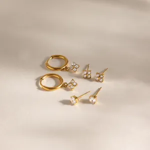 Elegant gold-plated stainless steel clover zircon hoop and stud earring set detail view.