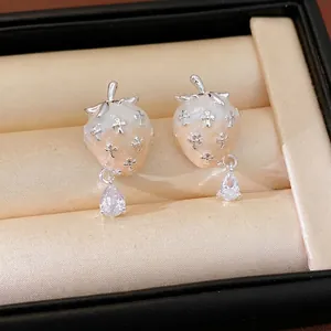 Elegant strawberry drop earrings featuring cross accents and a dangling teardrop cubic zirconia