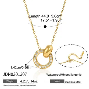 Close-up detail of 18k gold plated crystal double ring necklace with size parameters