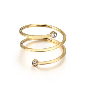 Minimalist gold stainless steel spiral coil ring with sparkling zircon accents.
