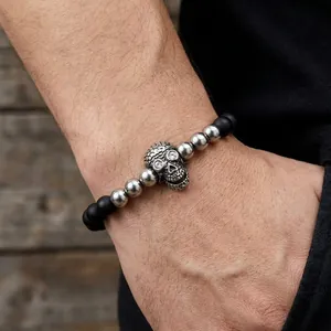 Men's retro skull bracelet with black agate beads and sparkling diamond eyes