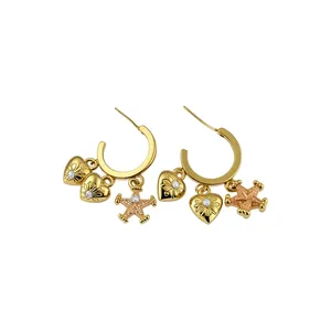 Elegant gold hoop earrings with micro-paved cubic zirconia heart and star charms