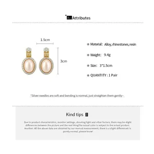 Spécifications détaillées des boucles d'oreilles vintage en strass et œil de chat
