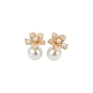 Elegant French camellia earrings with 18k gold plating, white pearls and sparkling zircons