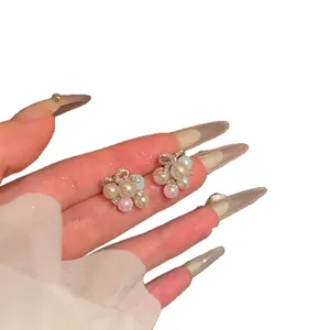 Sweet grape-shaped stud earrings with colorful pearl beads and bow detail