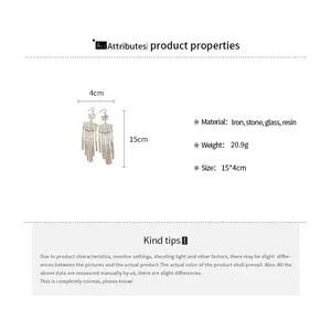 Detail of New Chinese style fan earrings with flower and long tassels