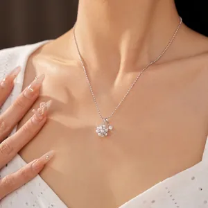 Elegant flower cluster pearl necklace with sparkling zircon accents on a silver chain