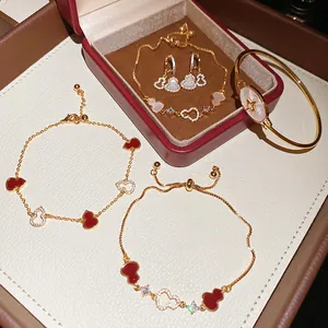 Detailed view of 18k gold plated hulu gourd jewelry set with zircon and shell inlays
