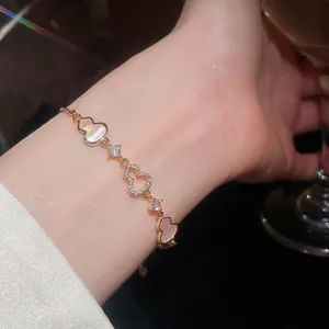 Elegant 18k gold plated wulu charm bracelet with sparkling zircon and mother of pearl
