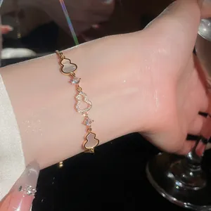 Elegant 18k gold plated gourd bracelet with pavé cubic zirconia and mother of pearl details