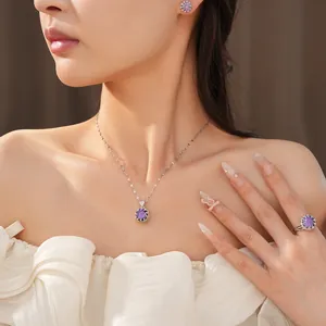 Elegante conjunto de joyas de circón morado con collar, anillo y pendientes