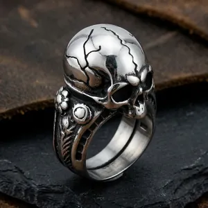 Detailed view of a gothic stainless steel skull ring with vintage cracked texture.