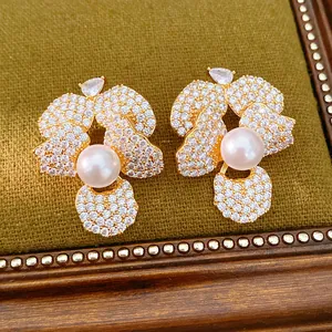 Exquisite flower pearl earrings featuring pavé zircon detail and silver needles