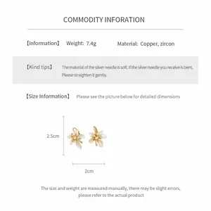 Detail view of floral earrings with zircon inlay showing 2.5cm x 2cm dimensions