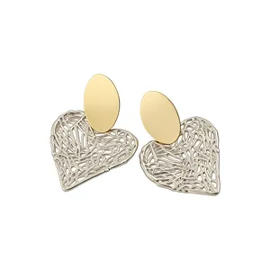 Elegant gold oval and silver filigree heart stud earrings for women with a vintage aesthetic