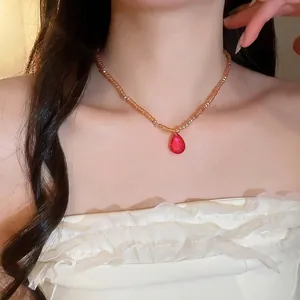 Elegant French style crystal beaded necklace featuring a vibrant red teardrop pendant for women