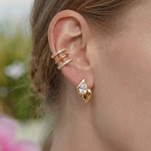 Detailed view of 18k gold plated stainless steel ear cuff set with teardrop gemstone earring