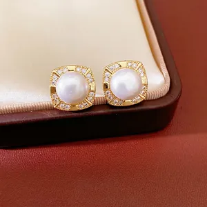 Elegant gold-plated square zircon stud earrings with central white pearl for women