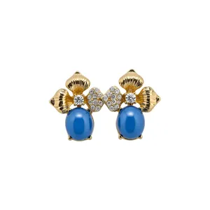 Vintage style floral stud earrings with gold plating and blue oval cabochon stones