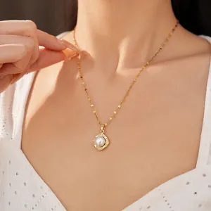 Elegant square pearl pendant necklace with zircon accents worn by a model
