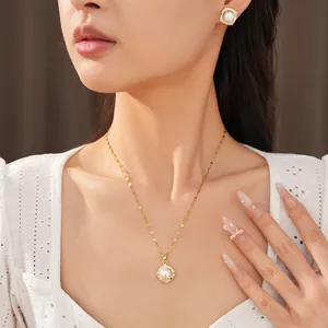 Detail view of pearl jewelry set including square zircon necklace and earrings