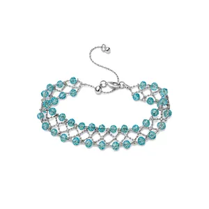 Light blue crystal woven hollow mesh bracelet with adjustable silver chain