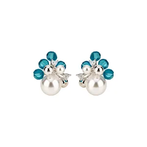 Elegant Korean style beaded pearl stud earrings featuring vibrant teal crystal accents
