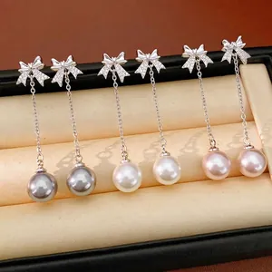 Élégantes Boucles d'Oreilles Pendantes Nœud Papillon Perle Artificielle Avec Tige en Argent Strass Incrusté Bijoux pour Femme Mariage Fête