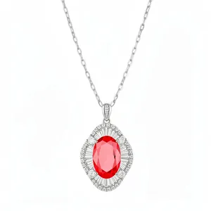 Elegant palace style necklace featuring an oval red zircon pendant and silver chain