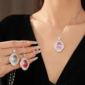 Exquisite detail of court style oval zircon necklaces in pink, blue, and red colors