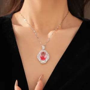 Elegant palace-style necklace featuring an exquisite oval pink zircon pendant on a model