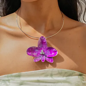 Detail view of vintage purple drip oil flower pendant choker with sparkling rhinestones