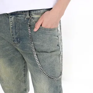 Punk retro Cuban pants chain for men with dragon head clasp shown on denim jeans