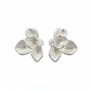 Silver needle zircon dripping oil flower stud earrings in white and silver finish