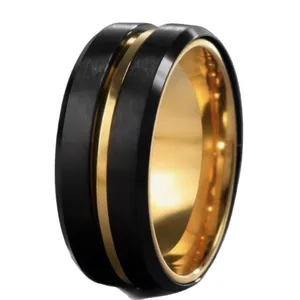 Brushed black and gold stainless steel spinner ring with a polished inner band