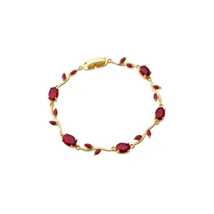 Elegant gold vine bracelet with red zircon gemstones inspired by the Monet Garden