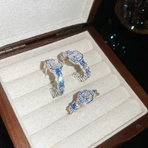 Elegant vintage palace style C-shape earrings and square blue zircon ring jewelry set