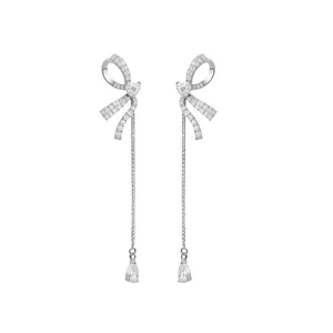 Elegant silver bow drop earrings with sparkling zirconia and pear pendants