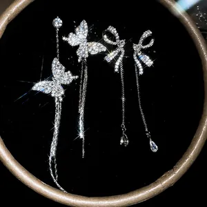 Dainty asymmetric zirconia butterfly and bow stud drop earrings with long tassels