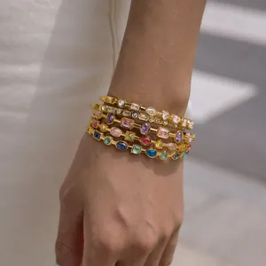 Elegant 18K gold stainless steel stacked bracelets featuring colorful square zircon stones.
