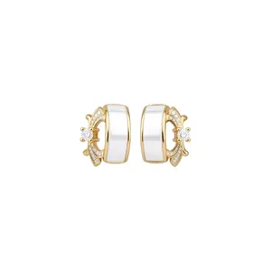 Elegant gold-plated iris flower earrings with white mother-of-pearl and cubic zirconia.