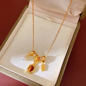 Collier Vintage en Cuivre Plaqué Or Avec Pendentif Ovale en Zirconia et Perle Artificielle Marron Chaîne de Clavicule pour Femmes