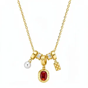 Collier doré vintage avec zircon rouge ovale et breloque perle au style minimaliste