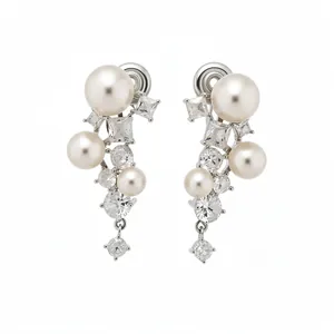 Elegant silver-tone ear clips featuring white pearls and sparkling geometric zircons.