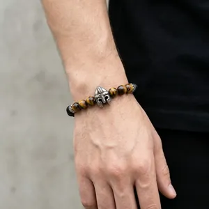 Men's Viking style bracelet with Spartan helmet charm, tiger eye and black onyx beads