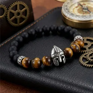 Detailed view of men's Viking Spartan helmet bracelet with tiger eye and onyx beads